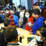 Crowds of thousands of young people at the Realm Pavilion at the Smartphone and Tab Expo